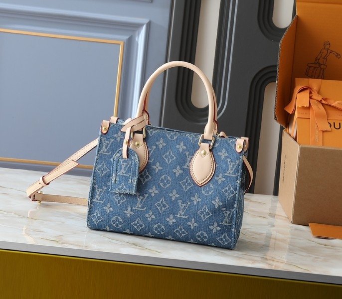 85A39D41-48FD-4261-F061-E78CBB90503B.jpg Monogram Denim OnTheGo PM In Blue - Image 1