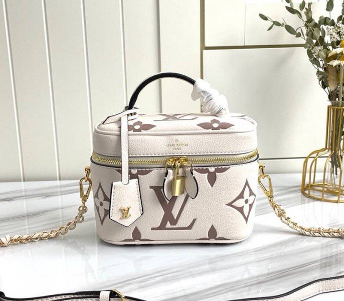 85CFDC94-D7B0-5BF1-1237-456F280AC3F4.jpg Louis Vuitton Bicolor Monogram Empreinte Vanity PM Bag In Cream And Bois De Rose Pink - Image 1