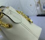 Louis Vuitton Monogram Empreinte Leather Bundle Bag In Cream - Image 7