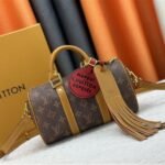 Louis Vuitton Monogram Dust Canvas Keepall Bandouliere 25 City Bag In Aged Natural