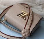 Louis Vuitton Epi Leather Twist MM Handbag In Galet Gray With Embroidered Strap - Image 4