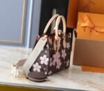 LV X TM Monogram Canvas Onthego PM With Cherry Blossom - Image 2