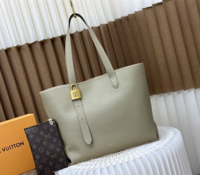 920099C3-9FAA-B9F9-A18F-E005FEC3325B.jpg Louis Vuitton Low Key Cabas MM Bag In Limestone Gray - Image 1
