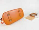 Louis Vuitton Epi Leather Alma BB Handbag In Orange With Jacquard Strap - Image 5