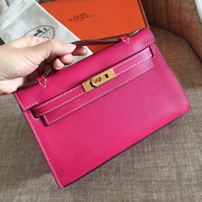 935D6E7A-785D-1309-0594-2707A55BD062.jpg Rose Red Epsom Knockoff Hermes Kelly Pochette Chic Mini Bag - Image 1