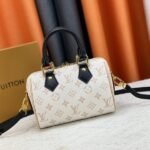 Louis Vuitton Monogram Dune Canvas Speedy 20 Handbag With Strap