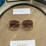 GUCCI GG0724S 001 WITH DETACHABLE JEWELLERY CHARMS