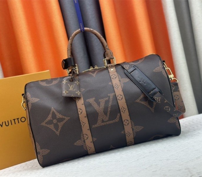96EC540D-820E-5A0B-8DB4-FF850185F572.jpg Louis Vuitton Monogram Giant And Monogram Reverse Canvas Keepall Bandouliere 45 - Image 1