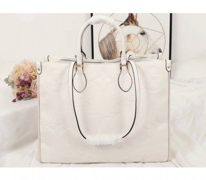982629A3-EC7E-8B2C-783C-977EE21F0946.jpg Louis Vuitton Monogram Empreinte Giant Onthego GM Tote In Cream - Image 1