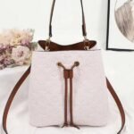 Louis Vuitton Monogram Empreinte NeoNoe MM Bag In Cream