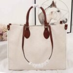 Louis Vuitton Monogram Empreinte Onthego GM Tote In Cream