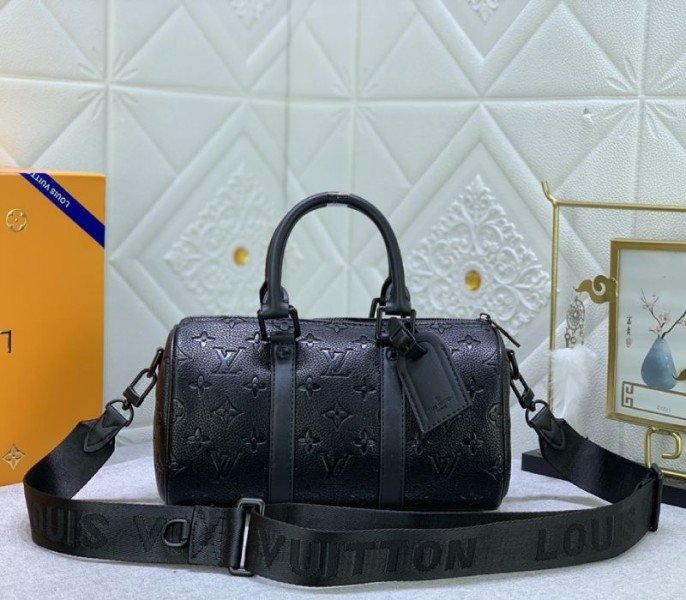 A0993DFD-8EA0-76C6-43E3-EF9101649E37.jpg Louis Vuitton Taurillon Monogram Leather Keepall Bandouliere 25 In Black - Image 1