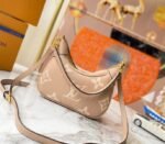 Louis Vuitton Bicolor Monogram Empreinte Leather Bagatelle Mini Hobo In Tourterelle Gray