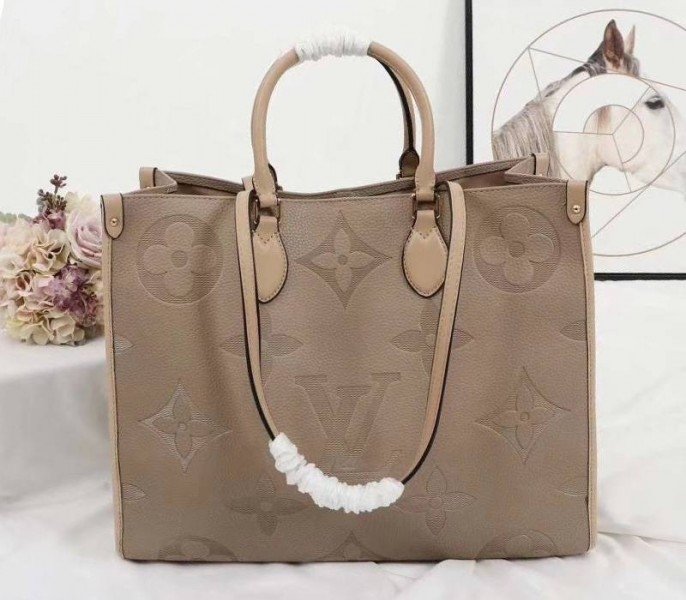 A346E885-AD60-369F-60AB-CA36FF5EC695.jpg Louis Vuitton Monogram Empreinte Giant Onthego GM Tote In Beige - Image 1