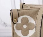 Louis Vuitton Monogram Empreinte OnTheGo MM Tote In Tourterelle Gray - Image 8