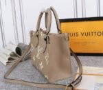 Louis Vuitton Bicolor Monogram Empreinte Leather Onthego PM Bag In Tourterelle Gray And Cream - Image 3