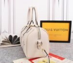 Louis Vuitton Bicolor Monogram Empreinte Leather Speedy Bandouliere 25 Handbag In Cream And Bois De Rose Pink - Image 3