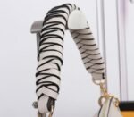 Louis Vuitton Monogram Empreinte Leather Maida Hobo In Cream - Image 8