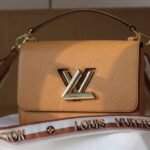 Louis Vuitton Epi Leather Twist MM Bag With Jacquard Strap In Honey Gold