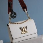 Louis Vuitton Epi Leather Twist MM Bag In Optic White With Jacquard Strap