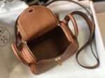 Top replica Hermes Lindy Mini handbag in gold - Image 2