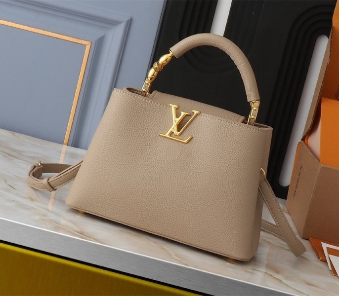 B990C67B-7CF8-C876-DE6B-7D2EDD0D0D55.jpg Louis Vuitton Capucines BB Handbag In Galet Gray - Image 1