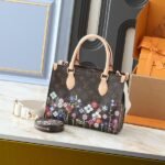 X TM Monogram Canvas Onthego PM