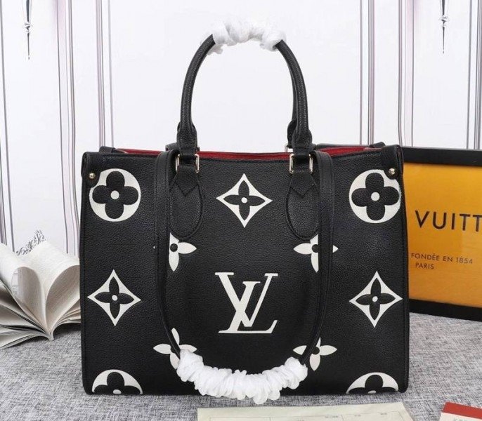 BABF279A-5FA6-5322-669F-A9C50A397849.jpg Louis Vuitton Monogram Empreinte OnTheGo MM Tote In Black - Image 1