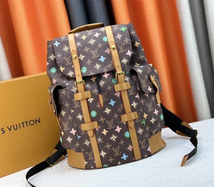BC34C2C1-0A8B-0B22-2D54-892625313B05.jpg Louis Vuitton Monogram Craggy Christopher MM Backpack In Chocolate - Image 1