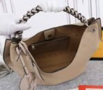 LV Mahina Carmel Hobo In Galet Gray - Image 5