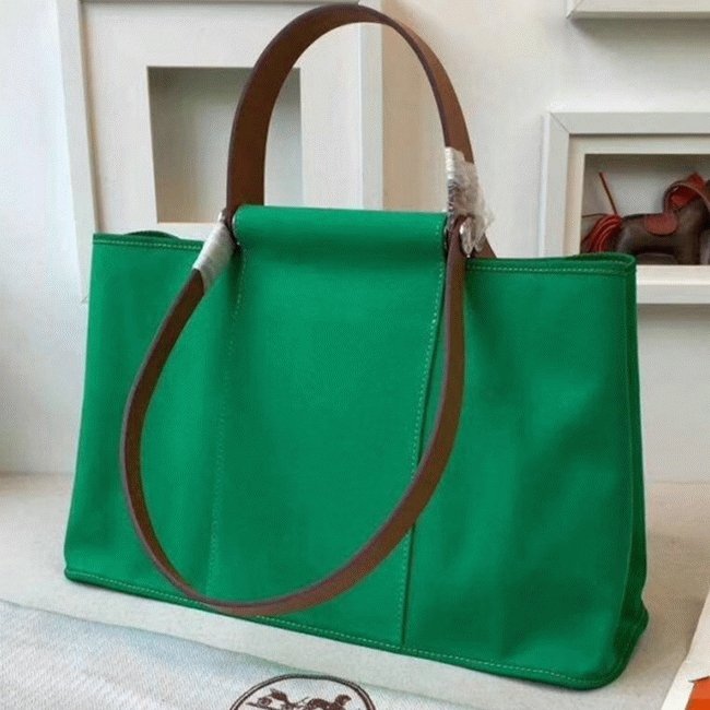 C220BFC9-FDAD-DC08-C121-5E77420659B0.jpg Bamboo Canvas Replica Hermes Cabag Elan Everyday Handbag - Image 1