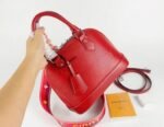 Louis Vuitton Epi Leather Alma BB Handbag In Red With Jacquard Strap - Image 7