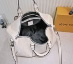 LV Monogram Empreinte Keepall Bandouliere 45 In Cream - Image 4