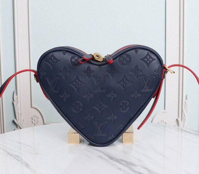 C74936CB-D3CD-891B-35FE-E815A2FA7AFA.jpg Louis Vuitton Monogram Empreinte Game On Coeur Bag In Navy Blue - Image 1