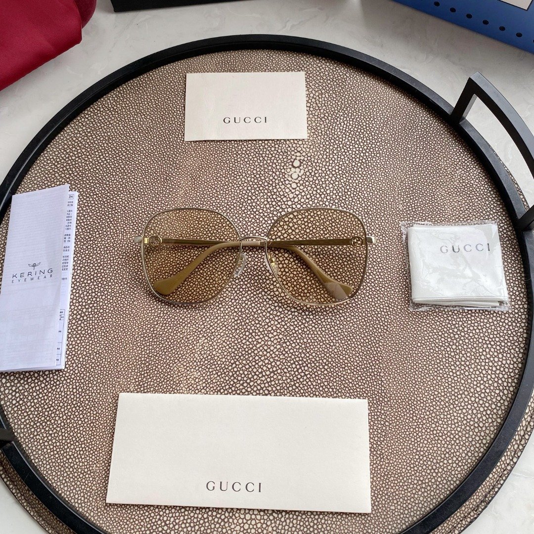 D006A212-F5F6-F873-401B-00B874C30361.jpg Gucci – GG0724S Gold - Image 1