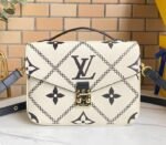 Louis Vuitton Spring 2022 Monogram Empreinte Pochette Metis Handbag In Cream