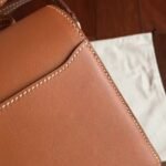 Caramel replica Hermes Mini Sac Roulis handbag - Image 2
