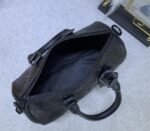 Louis Vuitton Taurillon Monogram Leather Keepall Bandouliere 25 In Black - Image 6