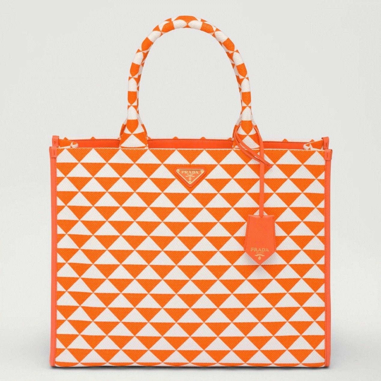 D5FD237F-F58A-F0ED-7C44-E1D8667F036A.jpg Prada Symbole Large Bag Imitation in Orange/White Jacquard Fabric - Image 1