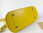 Louis Vuitton Epi Leather Alma PM Handbag In Cedrat Yellow With Jacquard Strap - Image 5