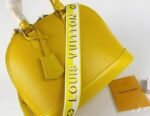Louis Vuitton Epi Leather Alma PM Handbag In Cedrat Yellow With Jacquard Strap - Image 6