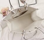 Louis Vuitton Monogram Empreinte Giant Onthego GM Tote In Cream - Image 6