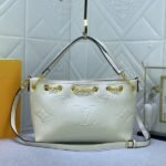 Louis Vuitton Monogram Empreinte Leather Bundle Bag In Cream