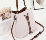 Louis Vuitton Monogram Empreinte NeoNoe MM Bag In Cream - Image 2