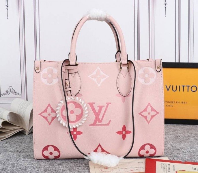 DEE50C56-2C04-F539-DE87-1CA088BA3FB5.jpg Louis Vuitton Monogram Empreinte Leather Onthego MM Bag In Pink - Image 1