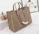 Louis Vuitton Monogram Empreinte Giant Onthego GM Tote In Beige - Image 2