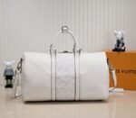 Louis Vuitton Taiga Leather Keepall Bandouliere 50 Travel Bag In White - Image 3