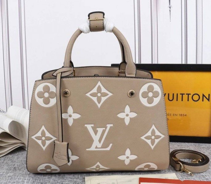 E251C933-BBD1-00FB-3147-F818F8DCA8A7.jpg Louis Vuitton Monogram Empreinte Montaigne MM In Tourterelle Gray - Image 1
