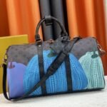 Louis Vuitton X YK Monogram Eclipse Reverse Keepall 45 Luggage In Pumpkin