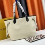 Louis Vuitton Monogram Empreinte Wild At Heart Neverfull MM Tote In Cream